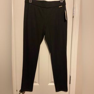 Black with gold accent professional leggings.